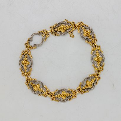 null Yellow gold bracelet with openwork design, a bouquet of roses framed by a set...