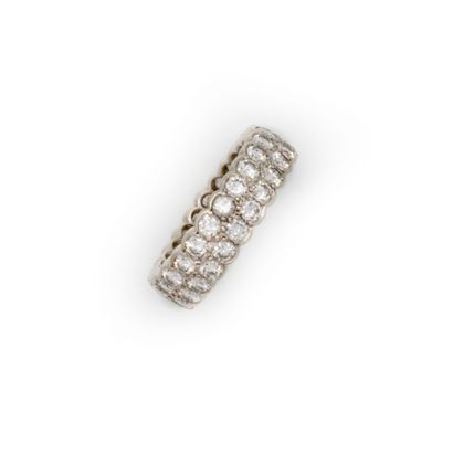  Double wedding ring in white gold with two rows of diamonds 
TDD : 55,5 
Gross weight...