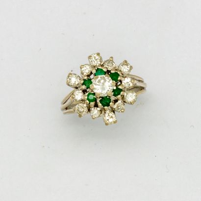 White gold flower ring set with a diamond...