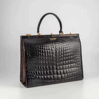  Large black crocodile bag, handle, key, monogrammed MCR 
H. 27 cm (excluding handle);...