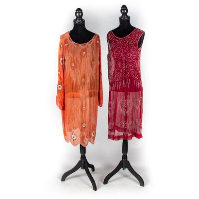 null Set of two dresses in coral and burgundy silk embroidered with pearls

One sleeveless...
