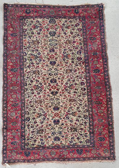 null Persian carpet type Kechan decorated with a sowing of flowers and interlacing...