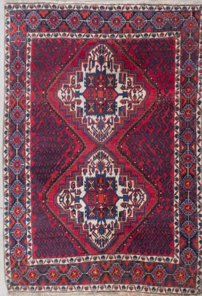 Red, blue and beige wool carpet with rhombus...