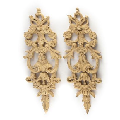 null Two decorative elements in openwork wood carved with flowers and foliage

18th...