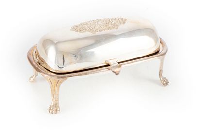 null Butter dish resting on four feet in the shape of lions' paws, glass lining 

L....