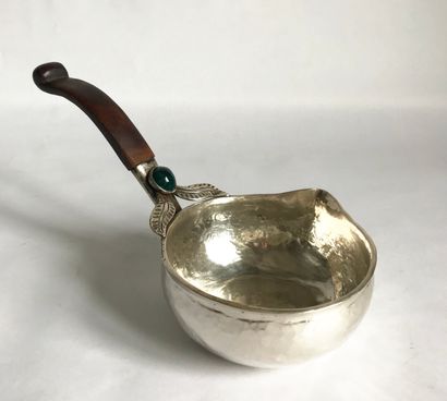 Hammered silver saucepan with a spout and...