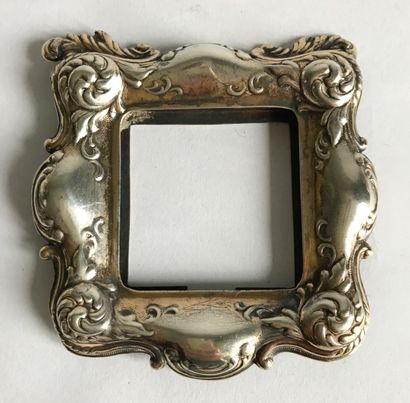 null Small silver photo frame (sterling) molded and chased with leaves. Foreign work...