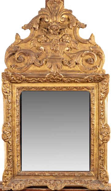 Small gilded wood mirror molded and chased...