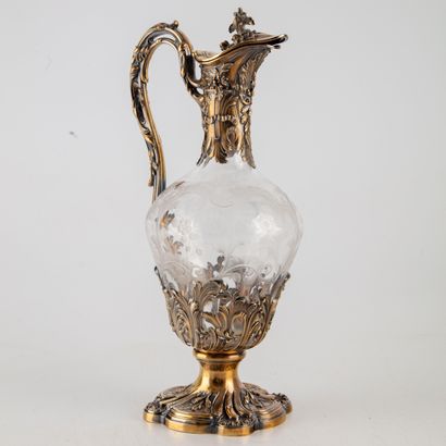 null Important cut and engraved crystal ewer, gilded silver frame, with chased decoration...