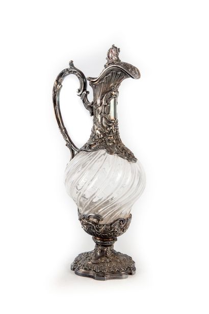 A large molded glass ewer with silver plated...