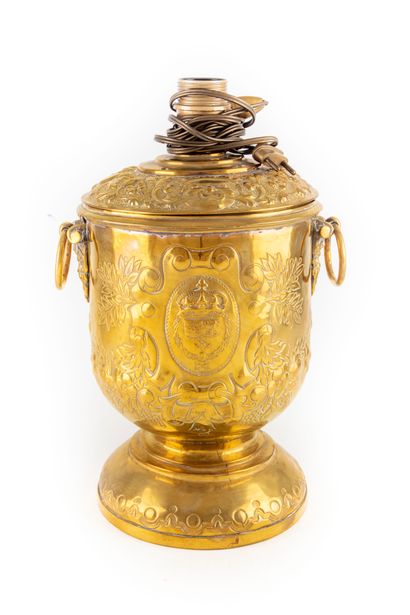  Large covered gilt copper vase, decorated in repoussé with flowers and foliage,...