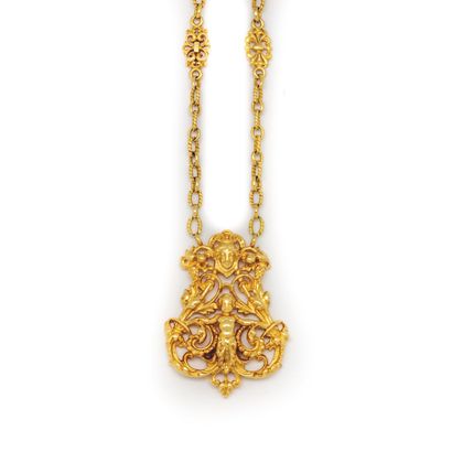 null 
Yellow gold necklace, the openwork pendant decorated with foliage and centered...