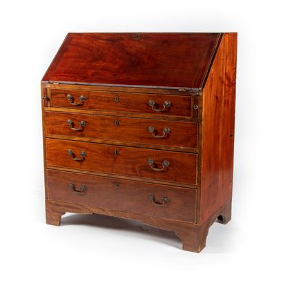  Mahogany and mahogany veneer scriban desk, it opens with a flap forming a desk discovering...