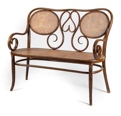 THONET In the taste of THONET 
Bench in curved wood, seat and back caned with heart...