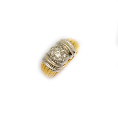 Yellow gold ring set with a diamond-paved...