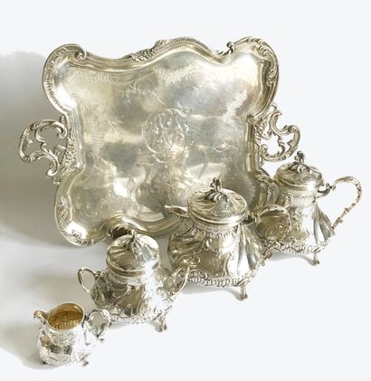 null Tea and coffee set in silver richly chased with Rocaille patterns and figured....