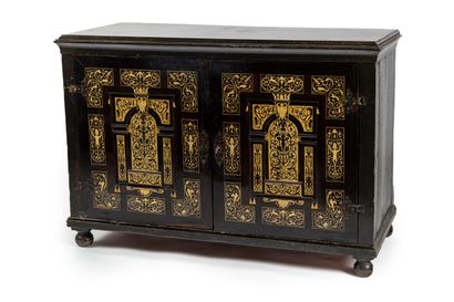 null Cabinet in blackened wood decorated with bone inlays with scrolls and grotesques...
