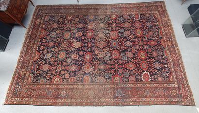  Persian carpet with stylized floral motifs...