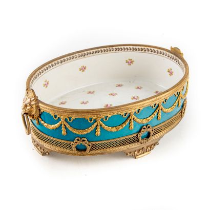 null Blue enamelled porcelain planter, the interior decorated with a motif of flowers,...