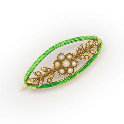 null Small brooch in yellow gold and enamel punctuated with small pearls

In its...