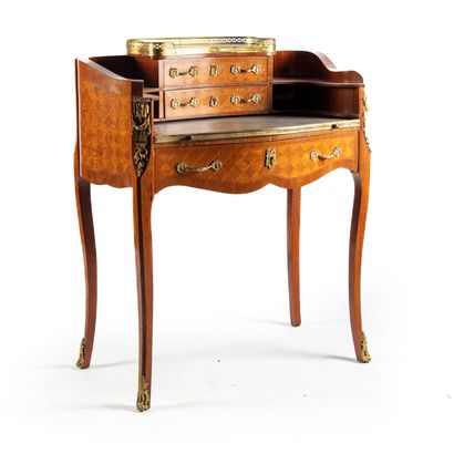 Small stepped lady's desk in veneer and marquetry...