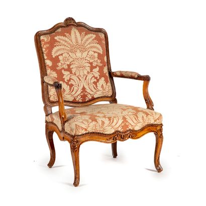 Armchair in natural wood with foliage decoration,...