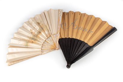 Set of two folded fans, 20th century 
One...