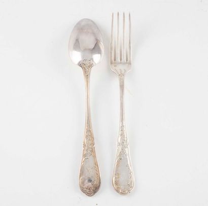 null 11 soup spoons and 11 forks, with the number "MD" and with a flower pattern...