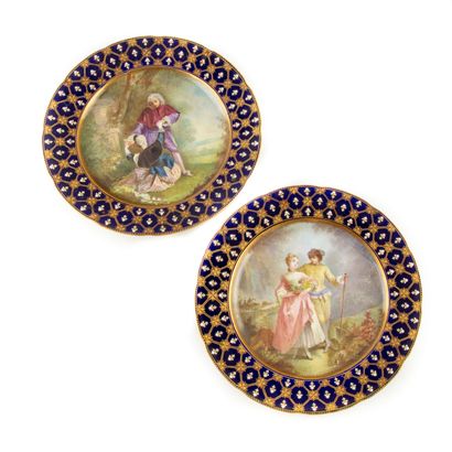 Pair of porcelain plates decorated with gallant...