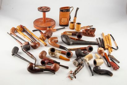 null Set of many pipes including one in meerschaum. We joined a leather pipe stand...