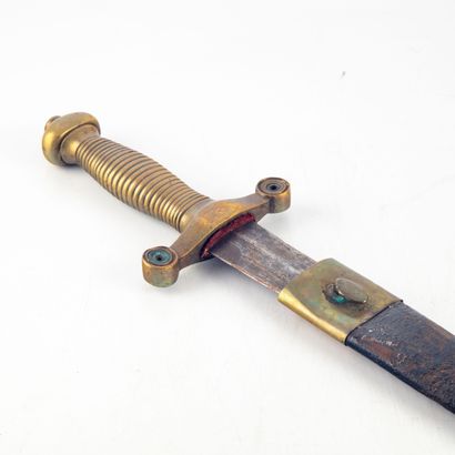 null Infantry sword with its leather and brass scabbard 


19th century


L. : 58...