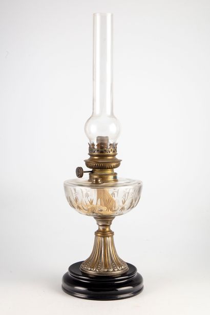 Kerosene lamp in cut glass and gilded metal...
