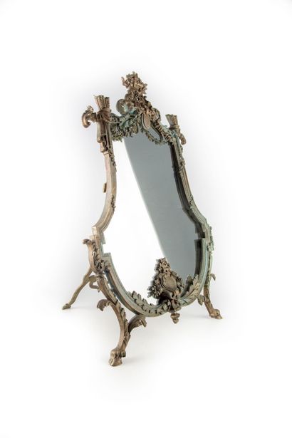 Mirror, bronze frame 
19th century 
H. 64...