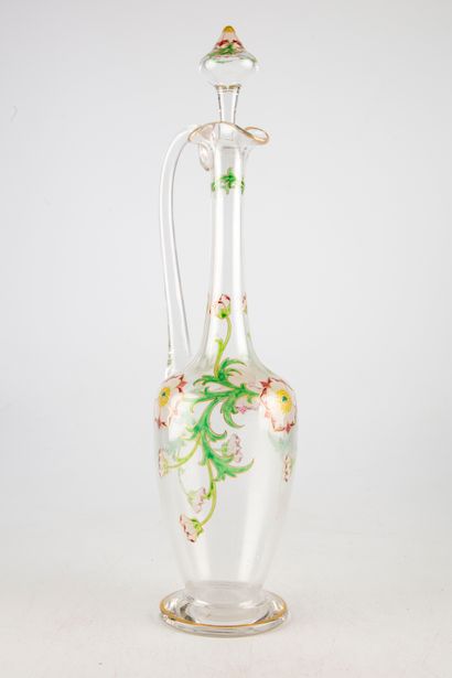 Large glass ewer with flower decoration in...