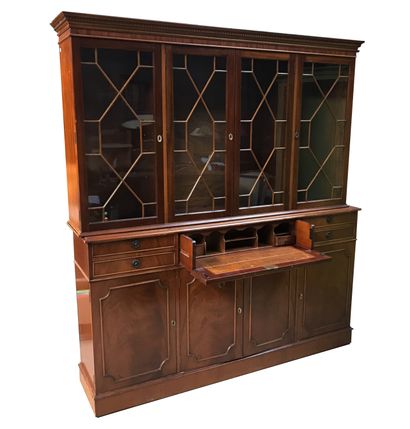 null Mahogany and mahogany veneer bookcase. The upper part opens with four glazed...