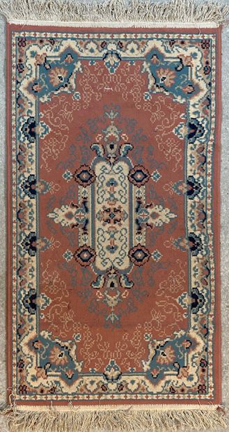 null Small carpet with flowers on a salmon field with a central medallion, multiple...