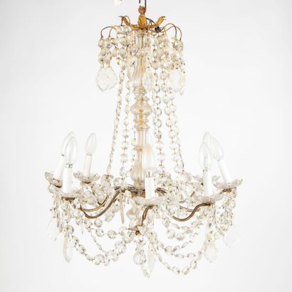 null Metal chandelier with eight arms of lights with garlands of pendants. 18th century...