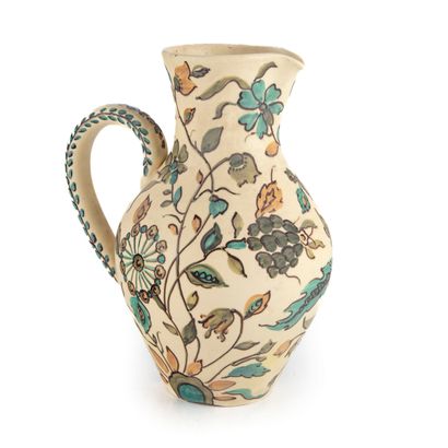 VALLAURIS VALLAURIS 

Enameled earthenware pitcher with flowers decoration

H. 27...