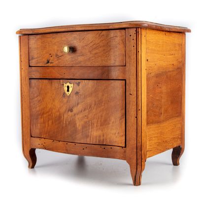 null Chest of drawers in natural wood with two drawers and resting on small curved...