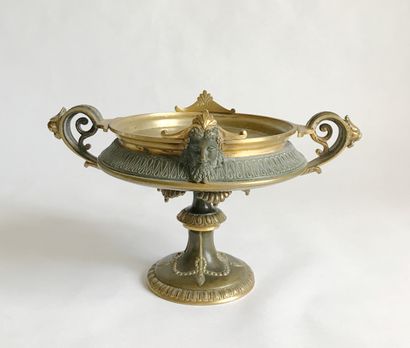 null Cup on foot in bronze with two patinas, molded and chiseled with friezes of...