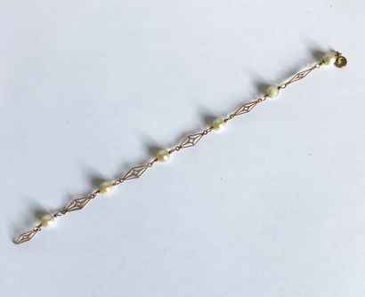 Articulated bracelet in yellow gold alternating...