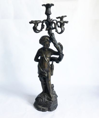 null Important patinated bronze torch representing a Putto supporting a bouquet of...