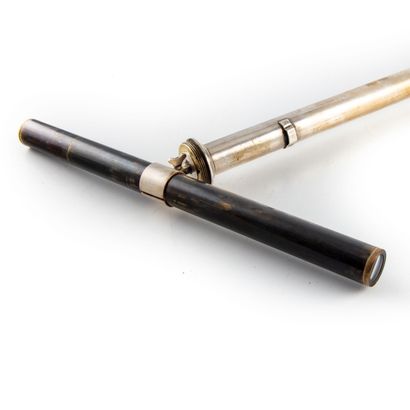 null Micro telescope cane, forming a silver plated metal spyglass. The ball-shaped...