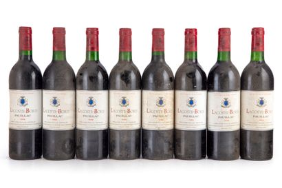 null "8 bottles Château Lacoste-Borie 1986 Pauillac

(N. 5 tlb, E. f, m, 1 a)"