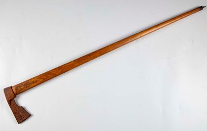 null Cane of soldier, the pommel out of carved wooden in the shape of axe with decoration...