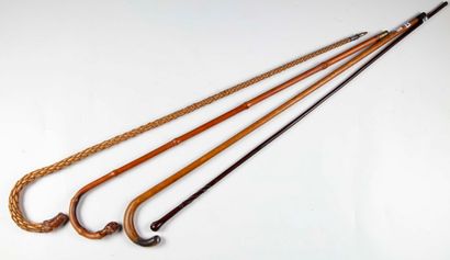 null Set of four canes:

-Four simple canes in various woods, one with a Toledo damascene...