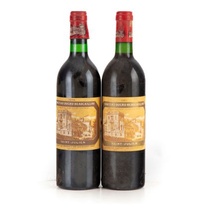 null "2 bouteilles : 1 Château Ducru Beaucaillou 1979 2e GC Saint-Julien, 1 bouteille...