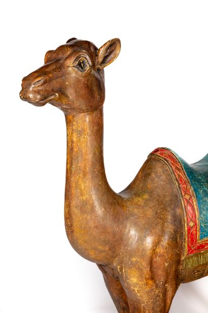 null ANONYME

Important chameau en bois sculpté polychrome formant sujet de mange

Vers...