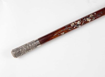 null Cane, the knob of Milord shape in silver with embossed decoration of foliage,...