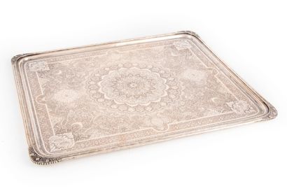 null Rectangular silver serving tray with rich chased and engraved decoration of...